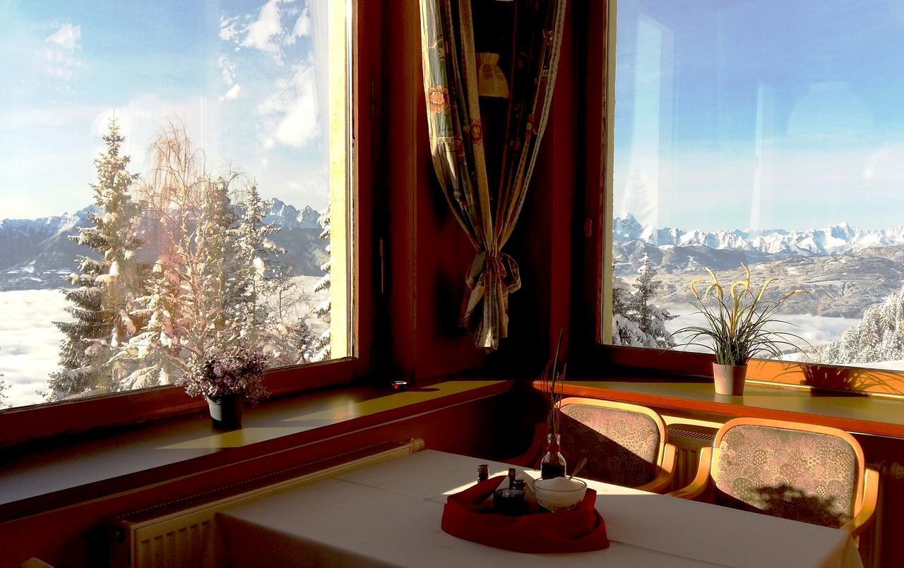 Hotel Alpinum Treffen Bagian luar foto