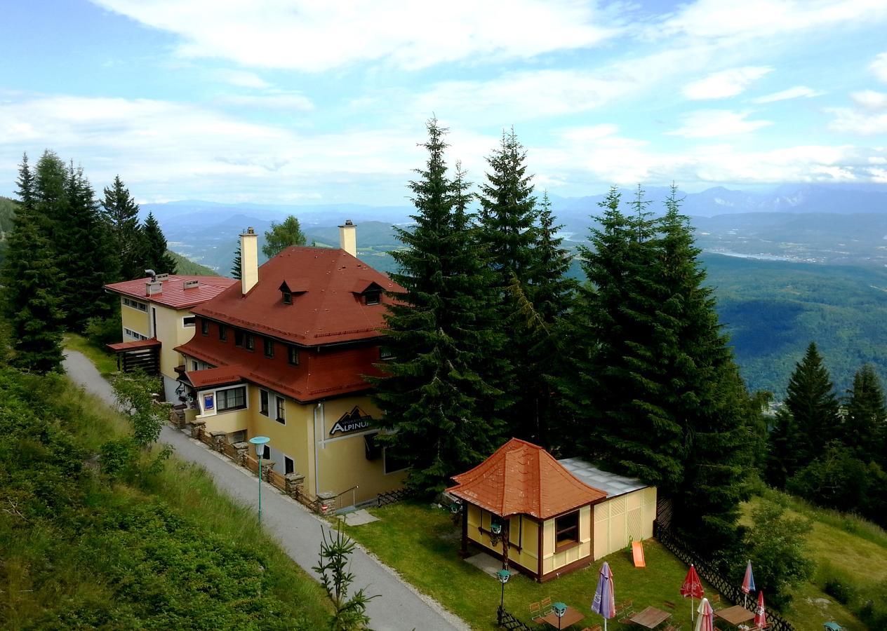 Hotel Alpinum Treffen Bagian luar foto