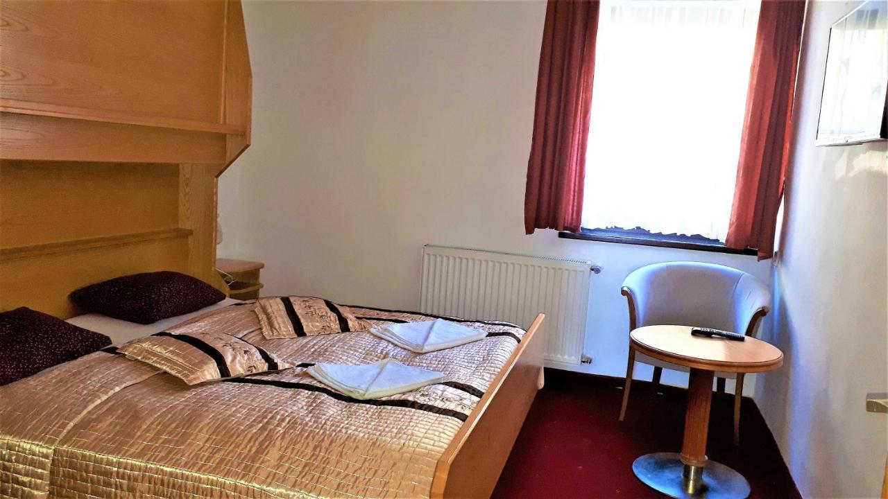 Hotel Alpinum Treffen Bagian luar foto